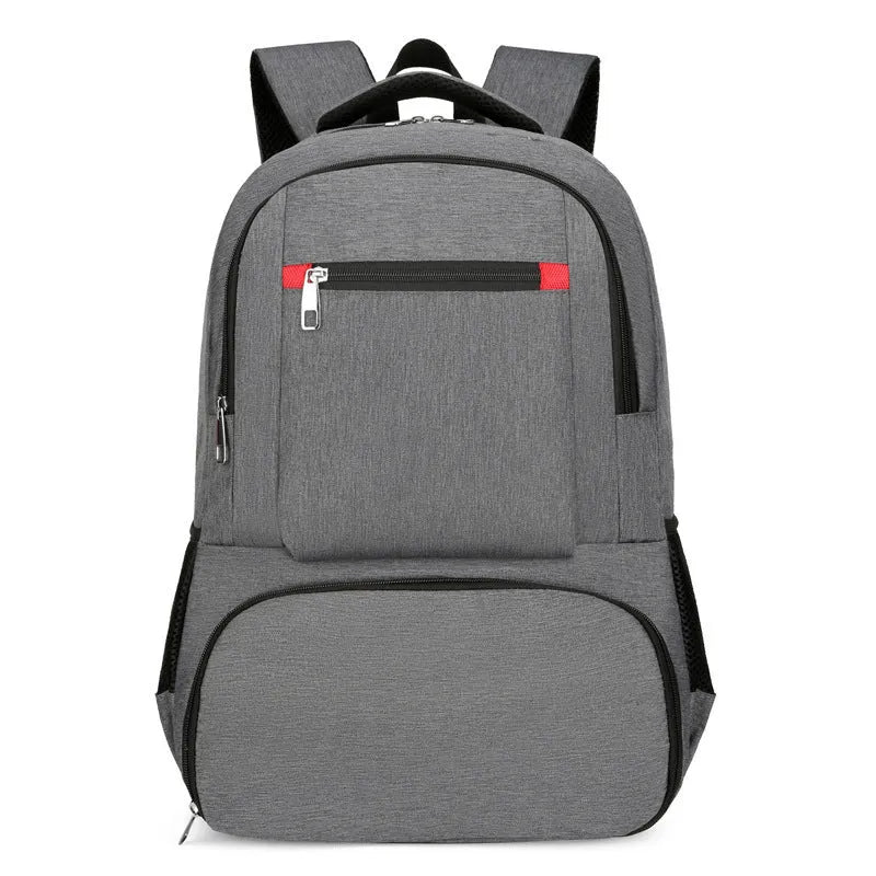 Light grey insulated oxford cloth backpack with curved shoulder straps and front compartments.