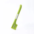 Green long-handle pet feeding spoon for canned cat and dog food on a white background.