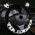 Black short plush car steering wheel cover shown on a vehicle steering wheel