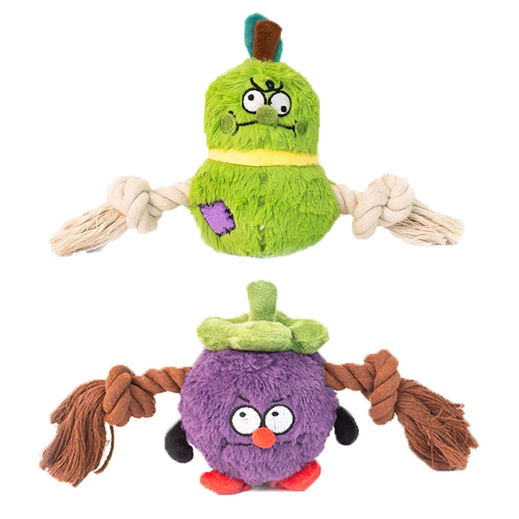 Green and purple plush rope knot dog toy with squeaker for tug of war and chewing.