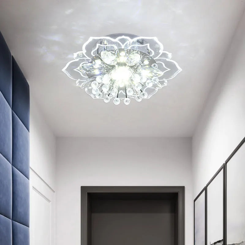 Small modern crystal ceiling lamp with flower-shaped shade in crystal, acrylic, and stainless steel materials