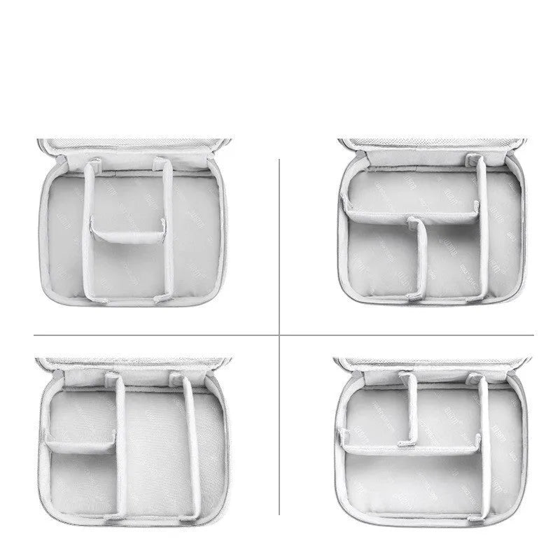 Black EVA digital storage bag with headset storage compartments open showing organisation for cables and accessories