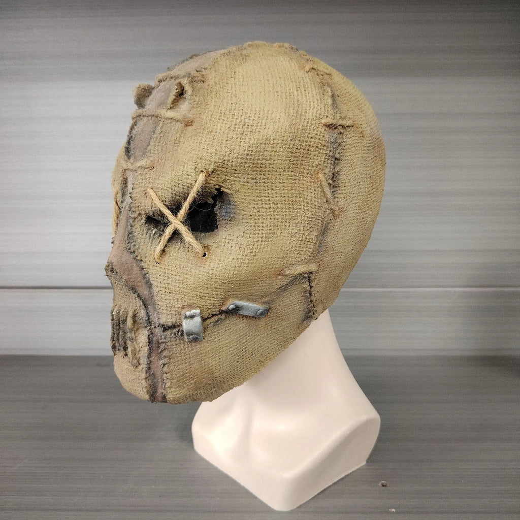 Latex Halloween horror mask showing detailed scarred skull modelling