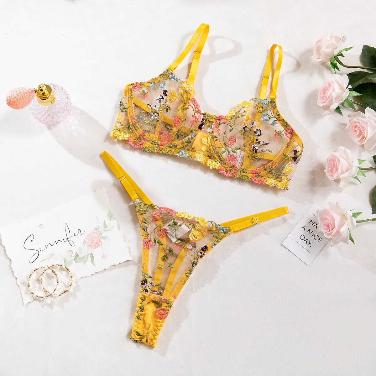 Floral mesh bra set with steel ring T-back and 3/4 cup design in multiple colours.
