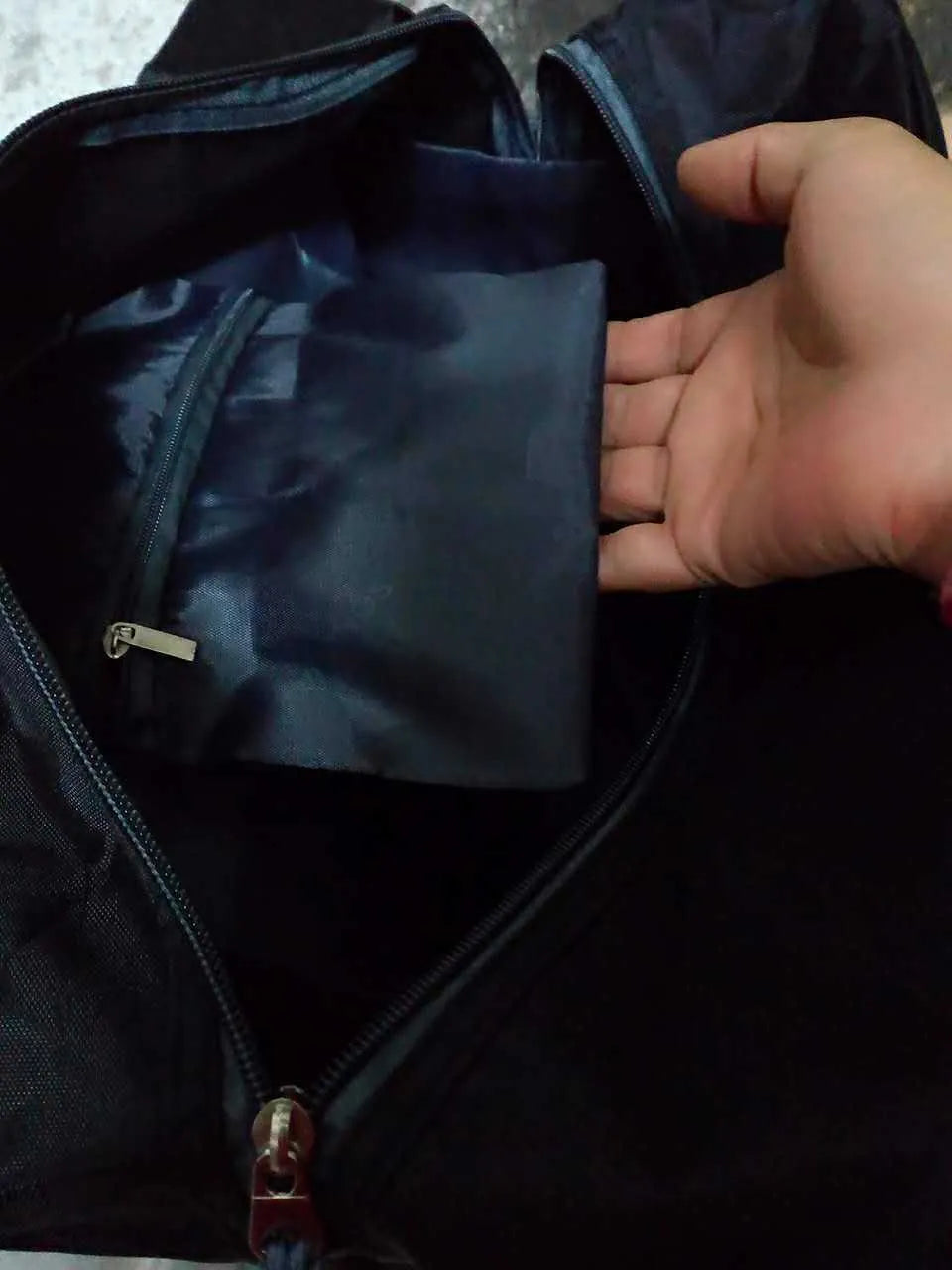 Nylon yoga and gym holdall bag in black, shown in medium and large sizes with carry handle.