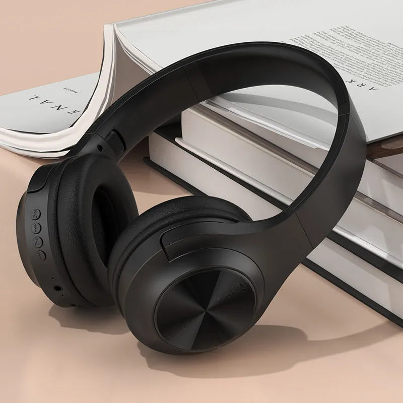Personalised wireless Bluetooth headset with charging case in chalk black, ivory white, or youth green colour.
