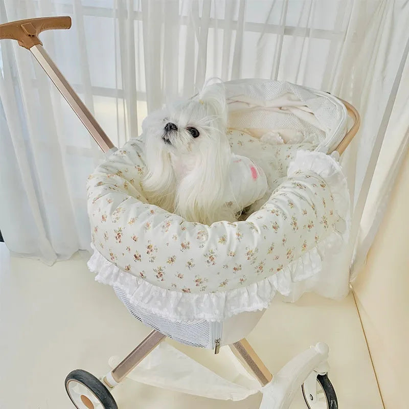 Pet stroller accessory set showing cotton anti-dirty towel, cushion, and pillow in a floral pattern.