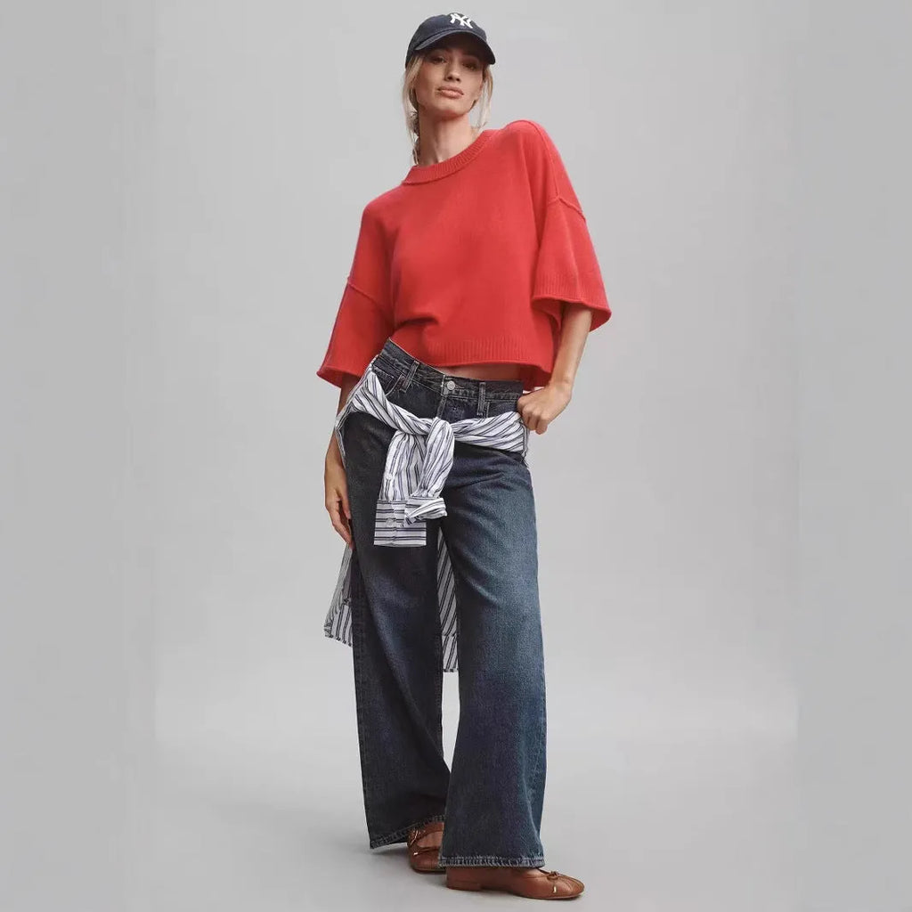 Red short viscose T-shirt with exposed navel styling on a mannequin.