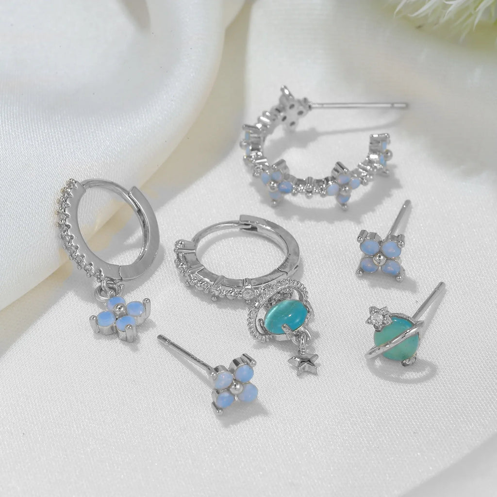 Gold and silver flower stud earrings with zircon mosaic detail in Japanese Korean style