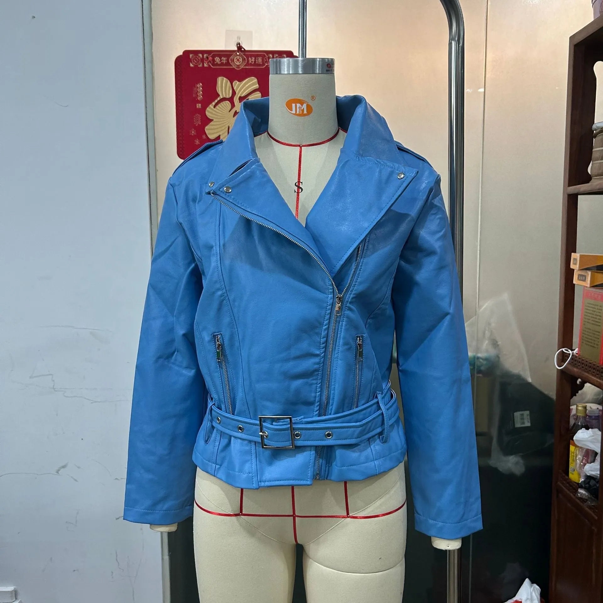 Punk style leather jacket with locomotive lapel and Peter Pan collar in polyester construction