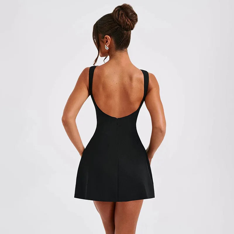Slim-fitting backless sleeveless short dress in a sling style on a hanger.