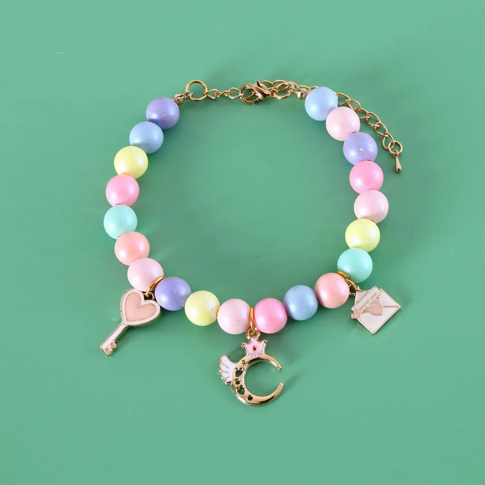 Colourful macaron-themed resin pet jewellery set with adjustable collar and bracelet for dogs and cats