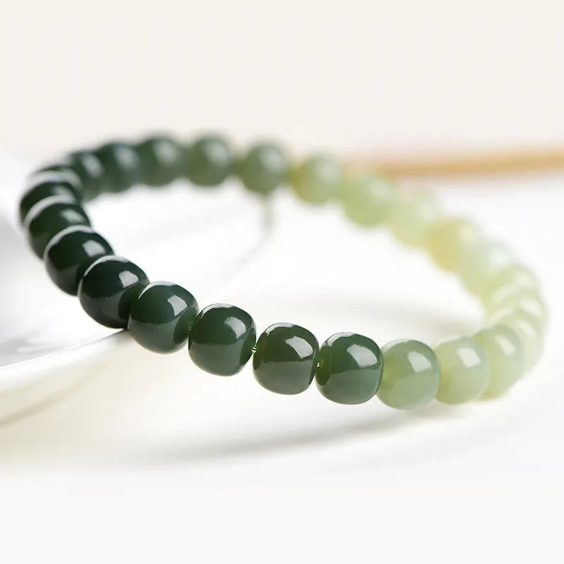 Natural Hetian jade bracelet with water gradient colours in polished beads