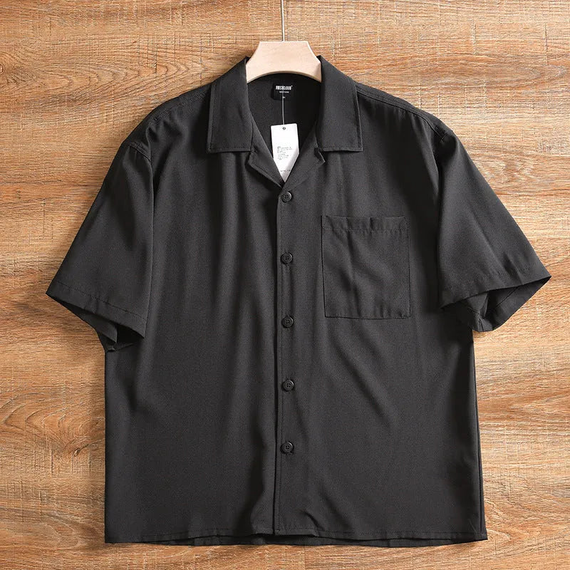 Men's loose fit short sleeve shirt in polyester cotton fabric, shown in army green colour