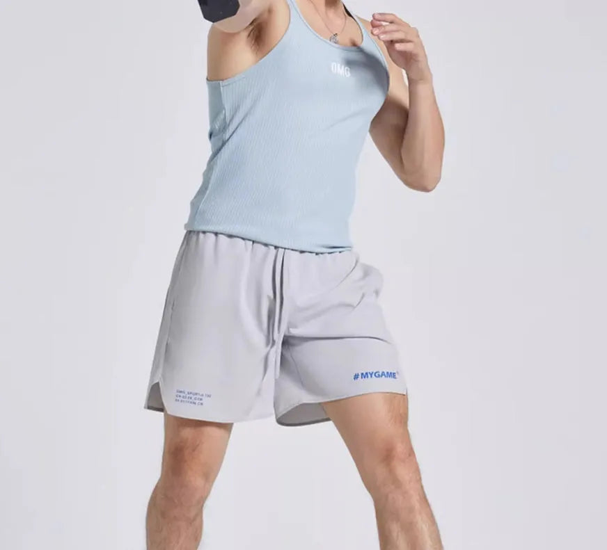 Men's fitness training shorts in midnight blue with moisture-wicking fabric and four-point stretch construction