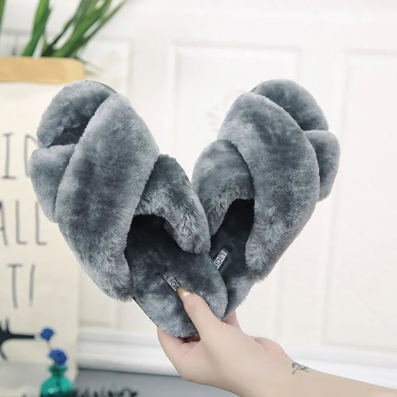 Cross open-toe fur slippers in pink with a patterned non-slip sole.