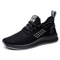 Men's black casual sports shoes with Flying Weave upper and flat low-heel profile.
