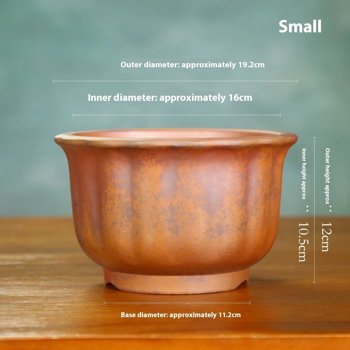 Indoor antique carved ceramic flower pot in purple sand clay with old pile texture