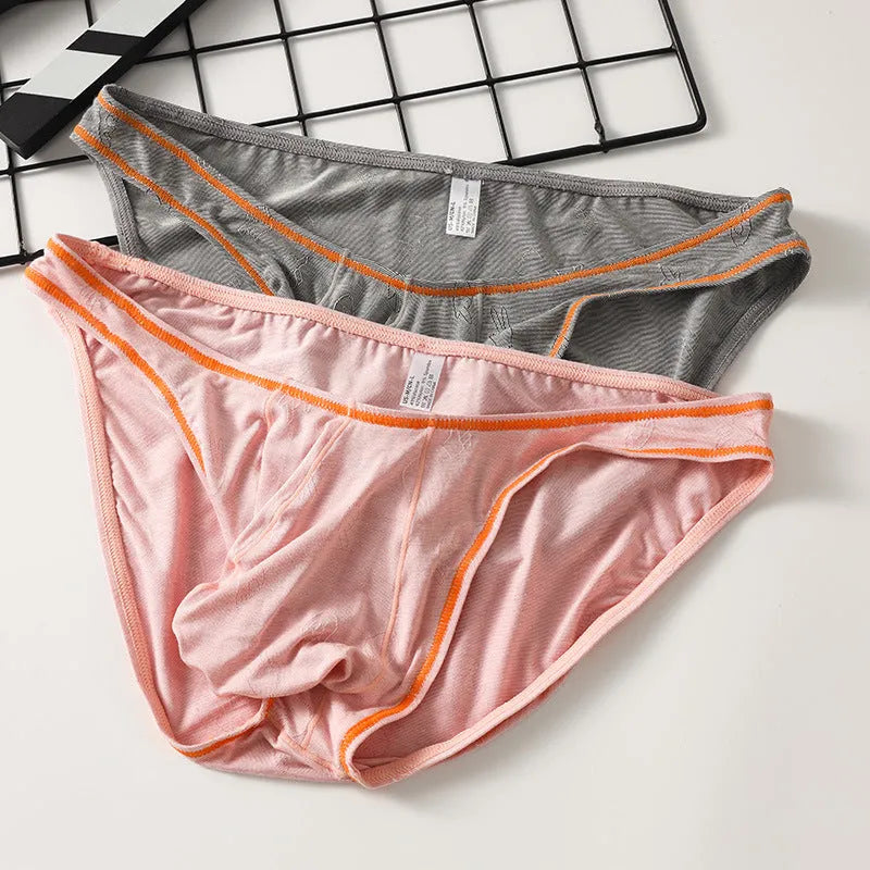 Men's modal knitted underwear in butt-lift hip design shown in multiple colour options.