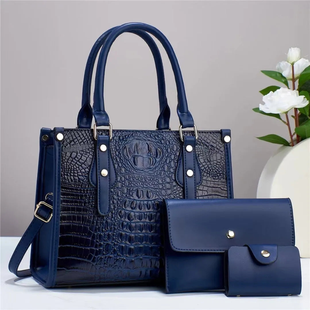 Three-piece PU bag set in chosen colour showing bucket crossbody bag, matching wallet, and card holder.