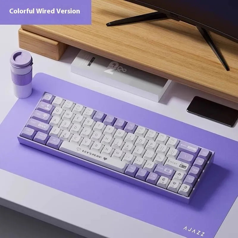AJAZZ AK680 wired mechanical keyboard with red and white keycaps on a desk.