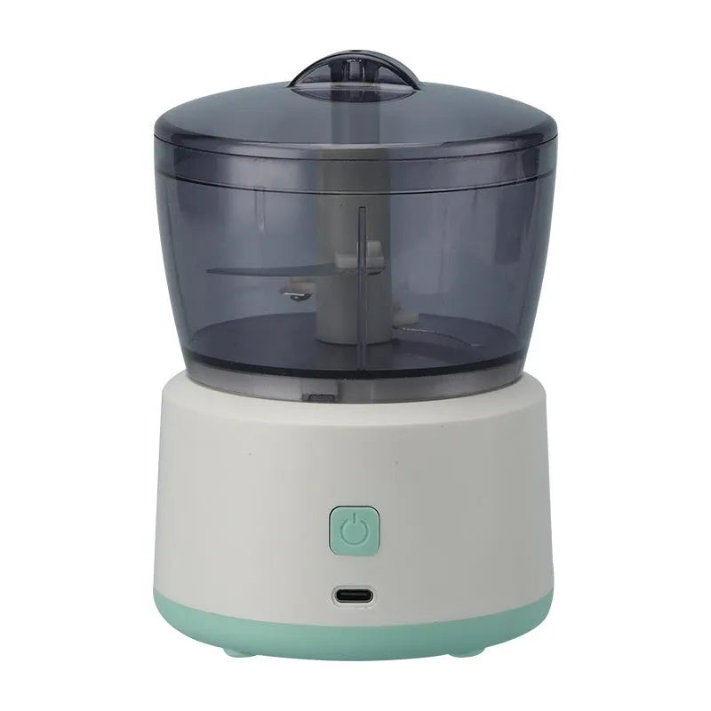 Mini electric meat grinder with transparent 225ml cup and stainless steel blades in light green or white