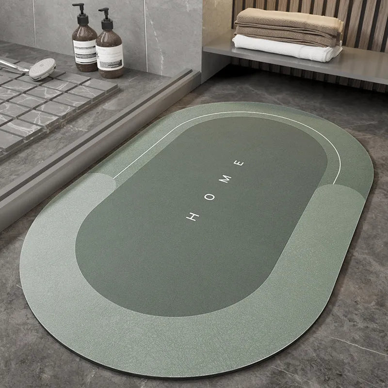 Blended fabric floor mat in an oval shape on a bathroom floor, available in multiple colours and sizes.