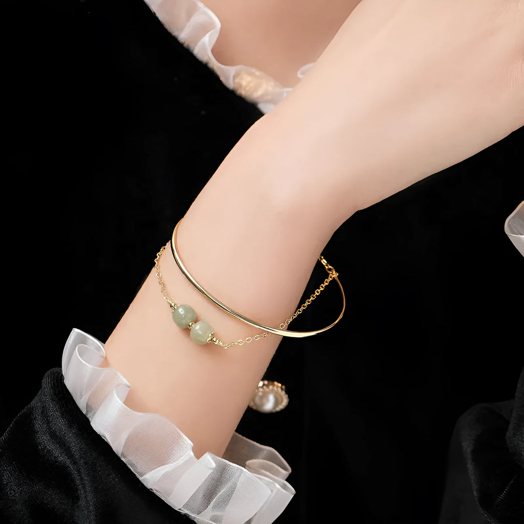 Women's Hetian jade bead bracelet with gold inlay detailing in single, double and three bead versions
