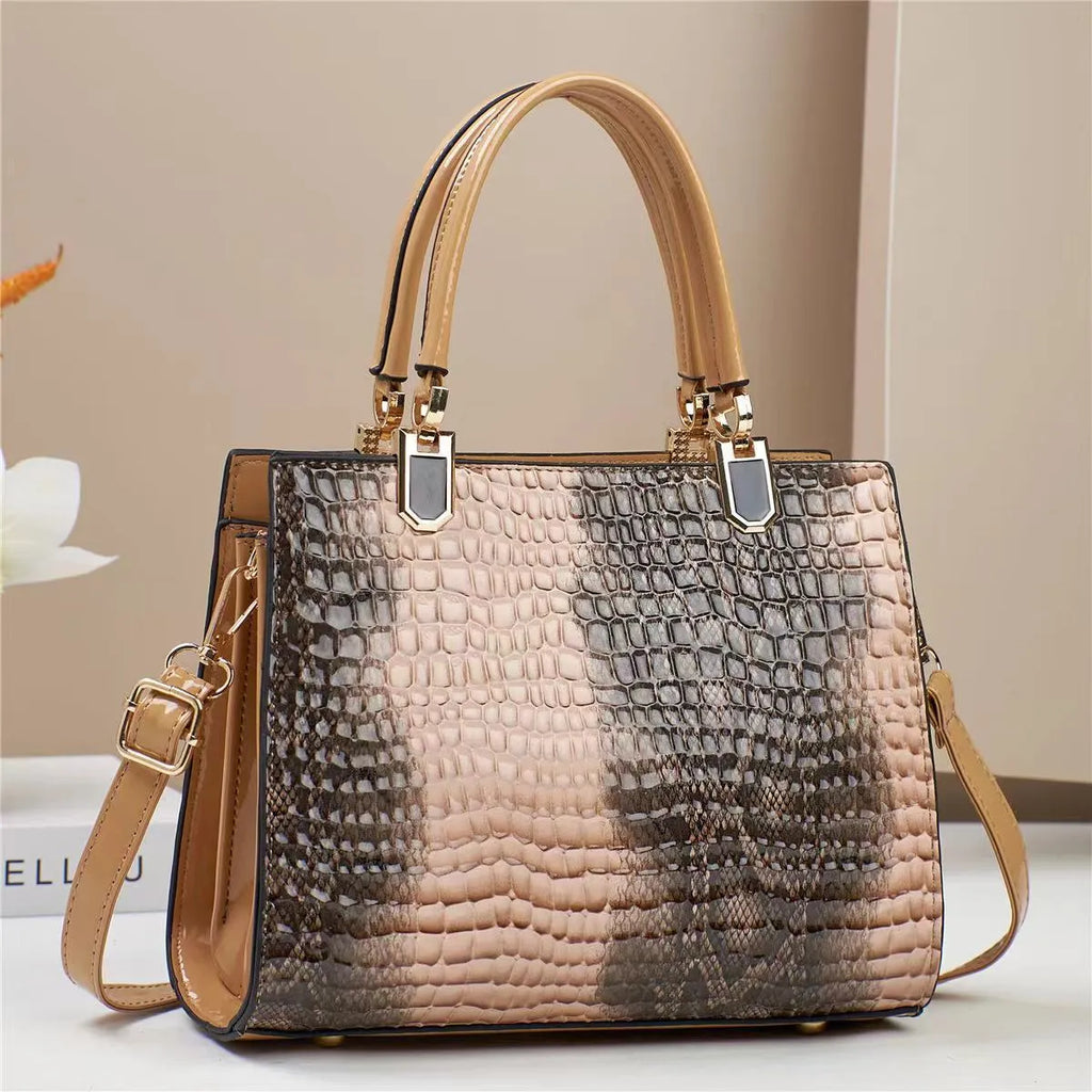 Soft PU leather one shoulder handbag in a horizontal square shape with internal organiser pockets.