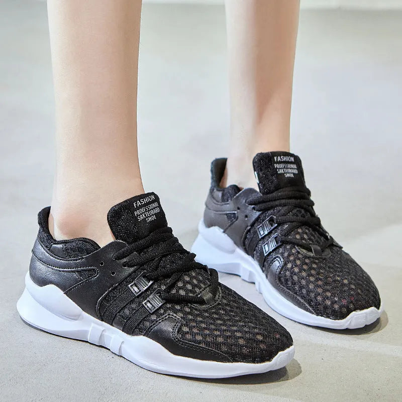 Side view of black hollow breathable mesh sneakers with flat EVA sole and round toe design