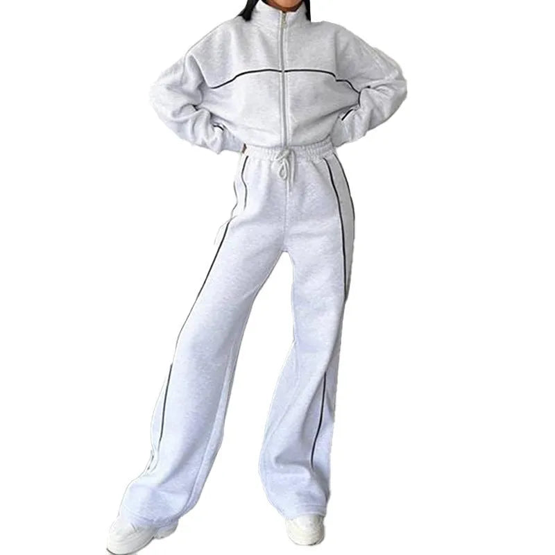 Casual polyester suit set showing a mock neck zip hoodie and matching striped trousers with lace-up detail.
