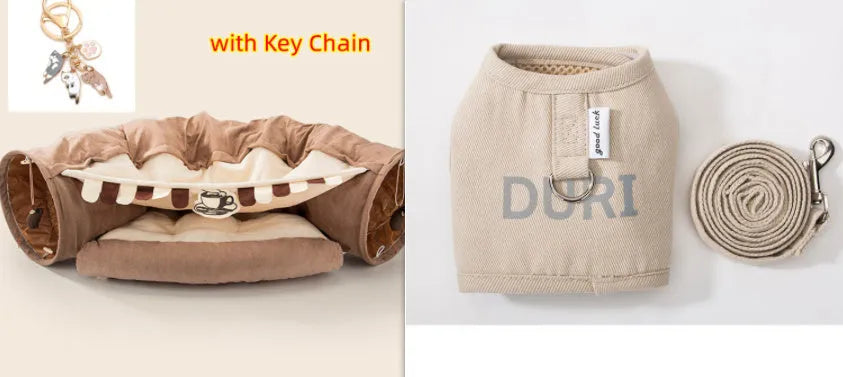 A collapsible cloth cat tunnel in Bar colour, showing its arched shape and dimensions for feline play.