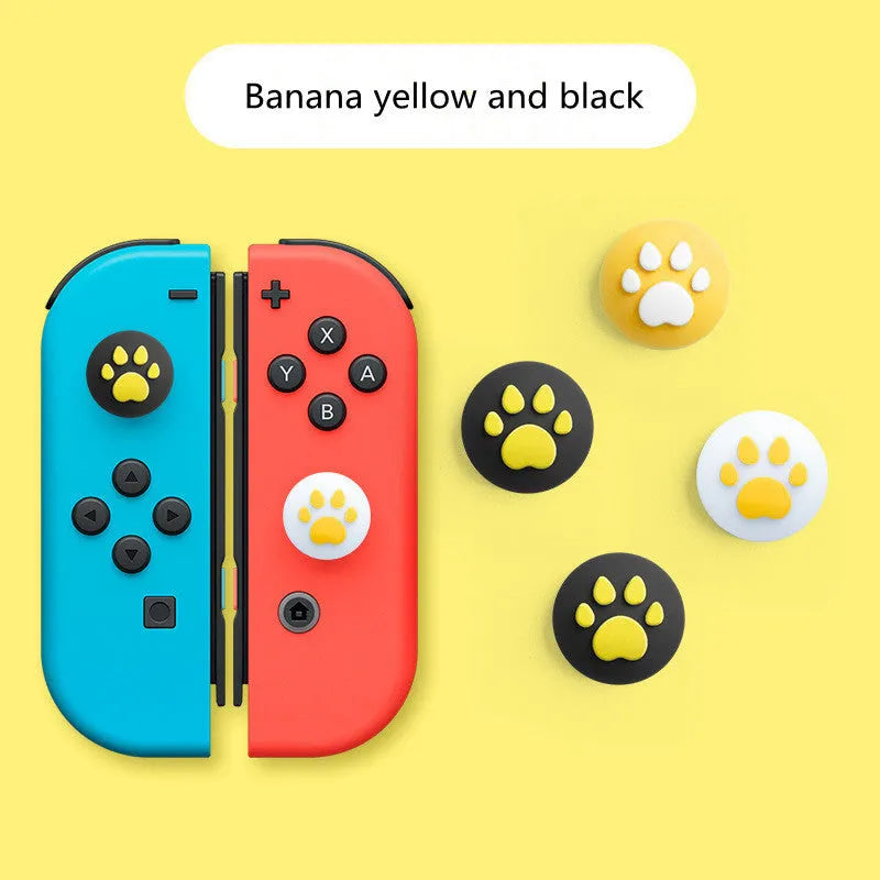 Four silicone rocker caps for Nintendo consoles in various colour combinations