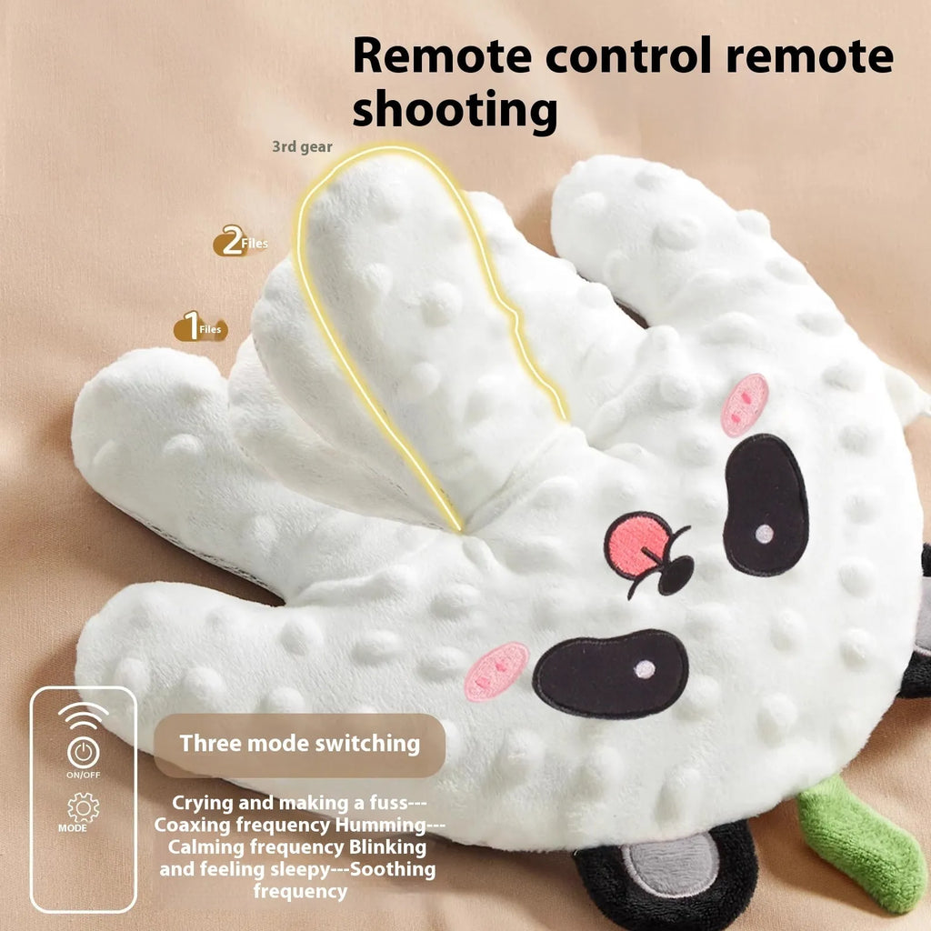 Electric pat shock big palm doll in cute panda style with remote control and charging cable on a neutral background