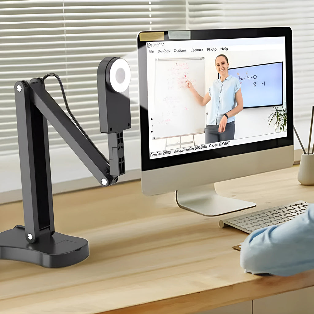 USB webcam with microphone for computer video calls, showing auto focus lens and cable connection