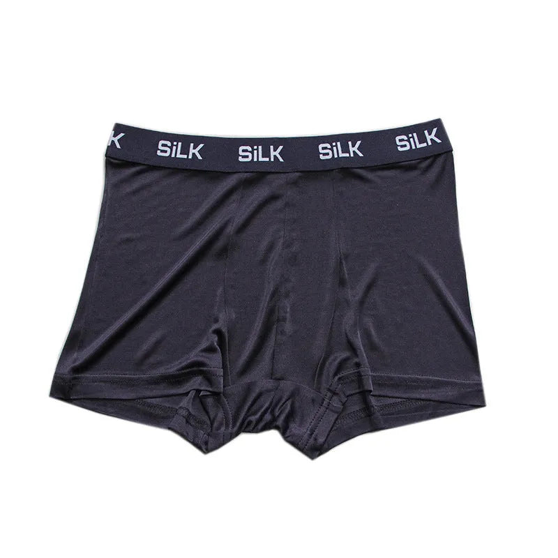 Men's silk shorts in loose fit with mid waist, available in navy blue, silver grey or skin colour