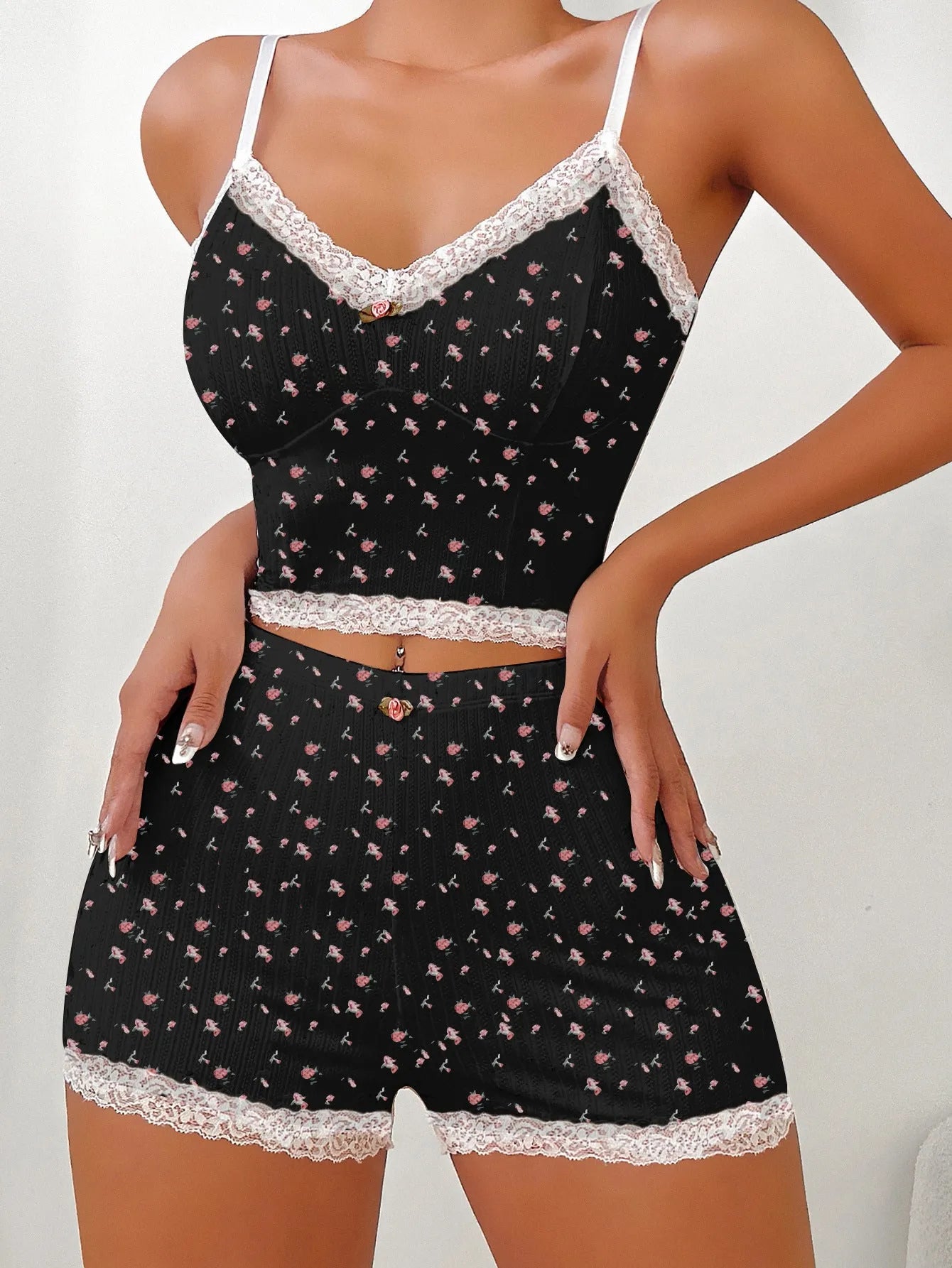 Design Sense ladies home leisure suit with sleeveless top and shorts in white background floral pattern