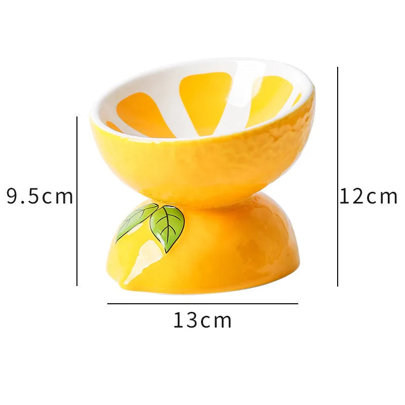 Orange ceramic raised cat bowl with tilted design and non-slip base.