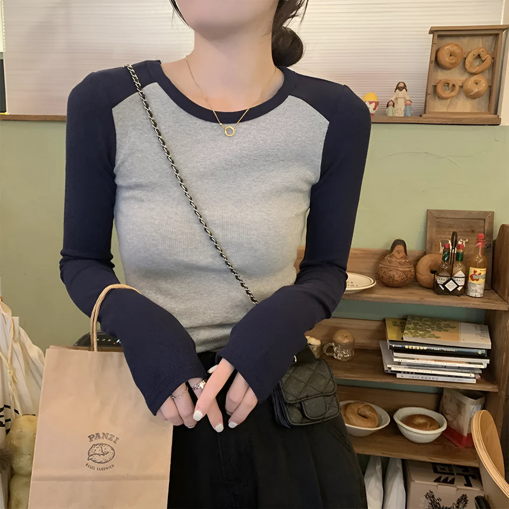 Women's slim fit viscose top with princess sleeves and embroidery detailing in dark blue colour