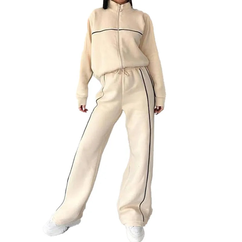 Casual polyester suit set showing a mock neck zip hoodie and matching striped trousers with lace-up detail.