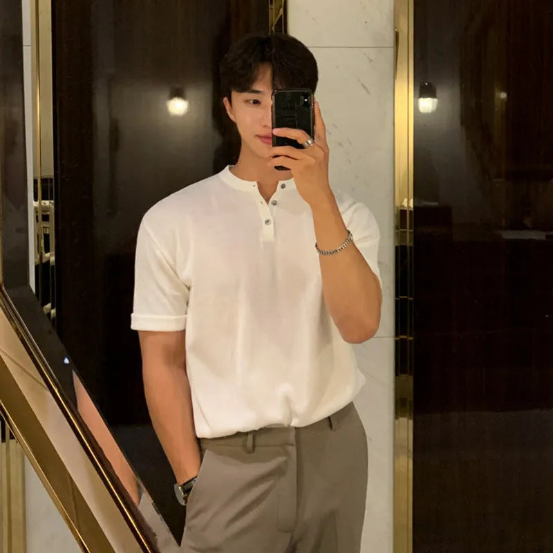 Men's black thin slim-fit short-sleeved knitted pullover shirt on a hanger.