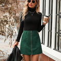 High-waist women's zip-front short skirt in polyester, shown in brick red colour with visible stitching detail.