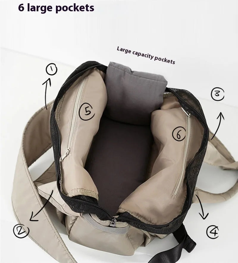 Apricot coloured cloth pet handbag for outdoor summer use.