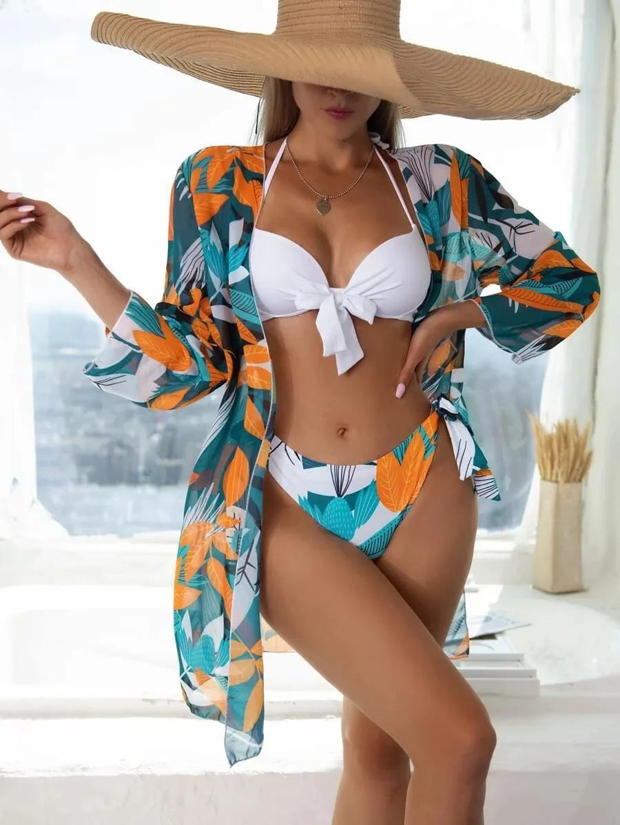 Women's three-piece bikini swimsuit set showing top, pants, and coat in mesh fabric.