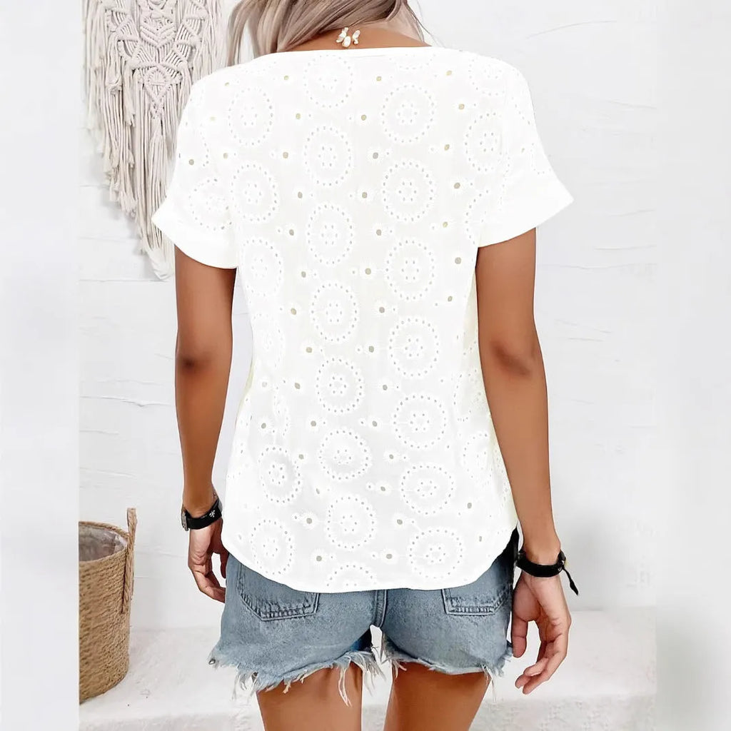 White women's V-neck T-shirt with hollow-out pattern detail on front
