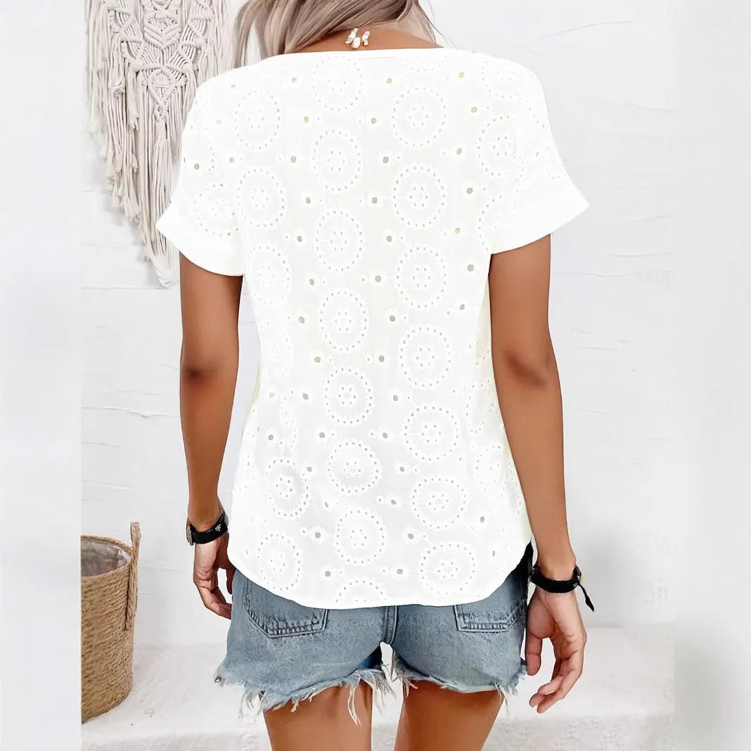 White women's V-neck T-shirt with hollow-out pattern detail on front