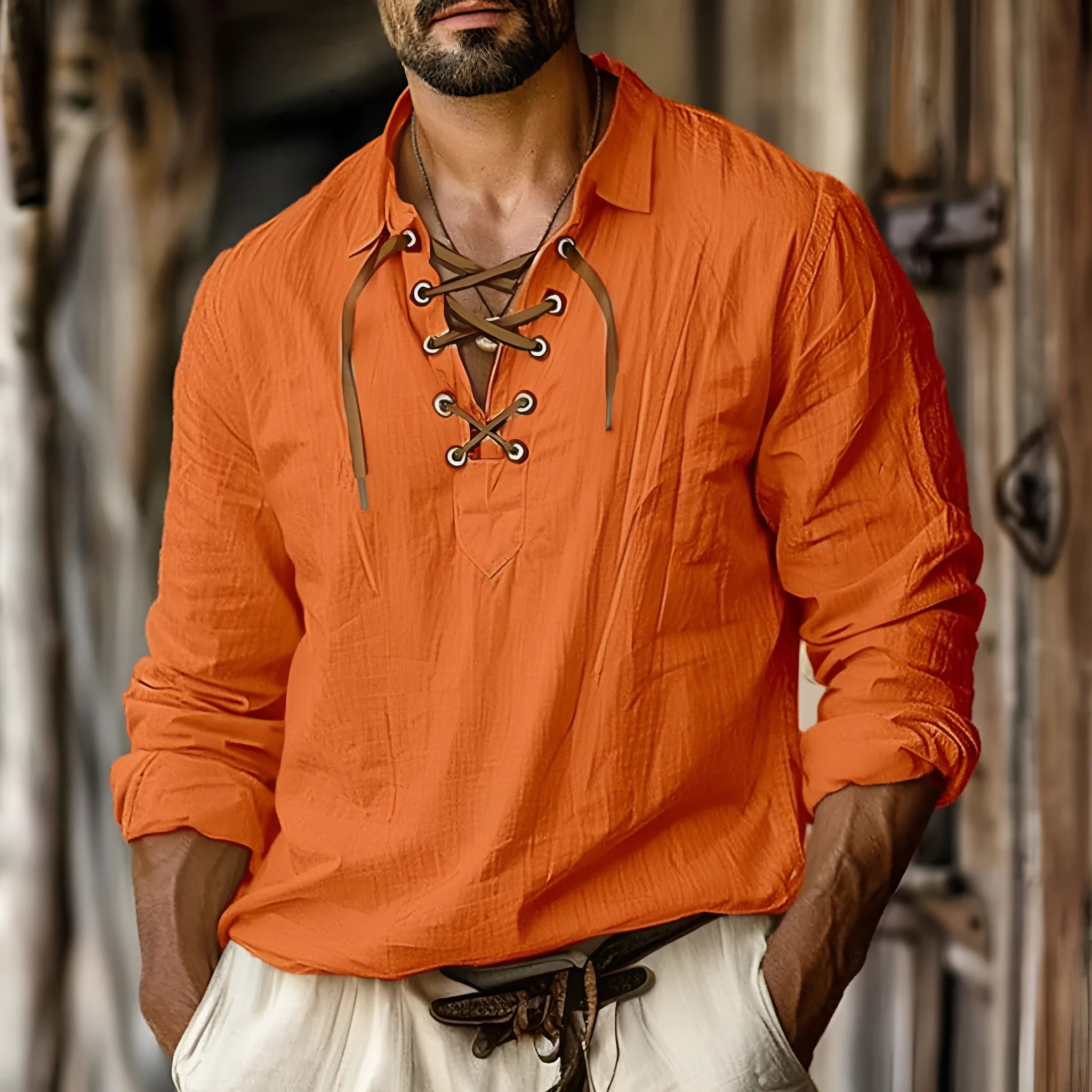 Men's loose fit long sleeve shirt with lapels and lace detail in a blue cotton-linen fabric.