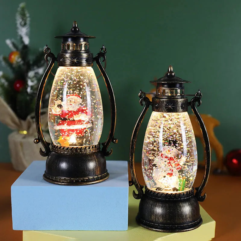 Plastic Christmas desktop oil lamp decoration with a glowing crystal ball and snowman figure.