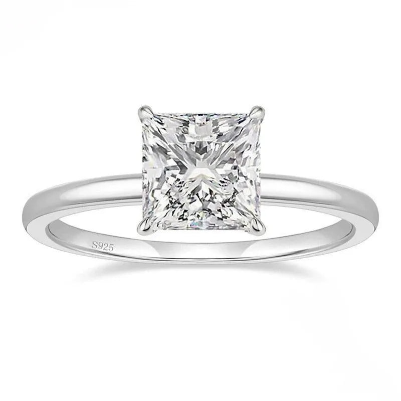 A geometric 925 silver ring with a round zirconium detail, shown in silver, gold, and rose gold finishes.