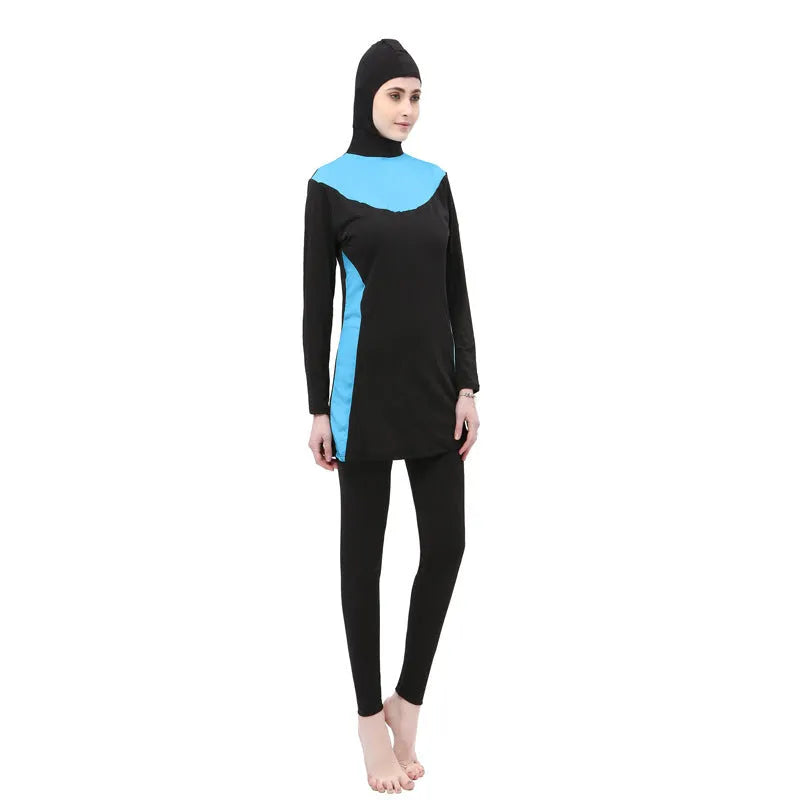 Conservative women's long sleeve swimsuit with hood in black and rose red, showing separate top and trousers.